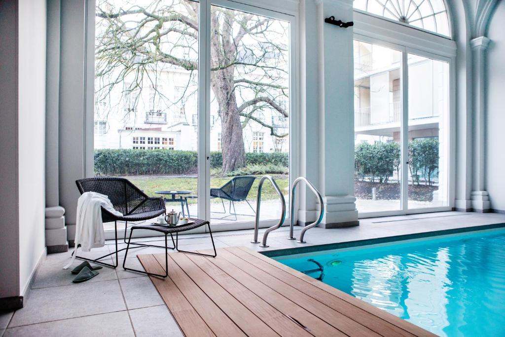 Piscine intérieure et espace bien-être du Pillows Grand Boutique Hotel Reylof à Gand